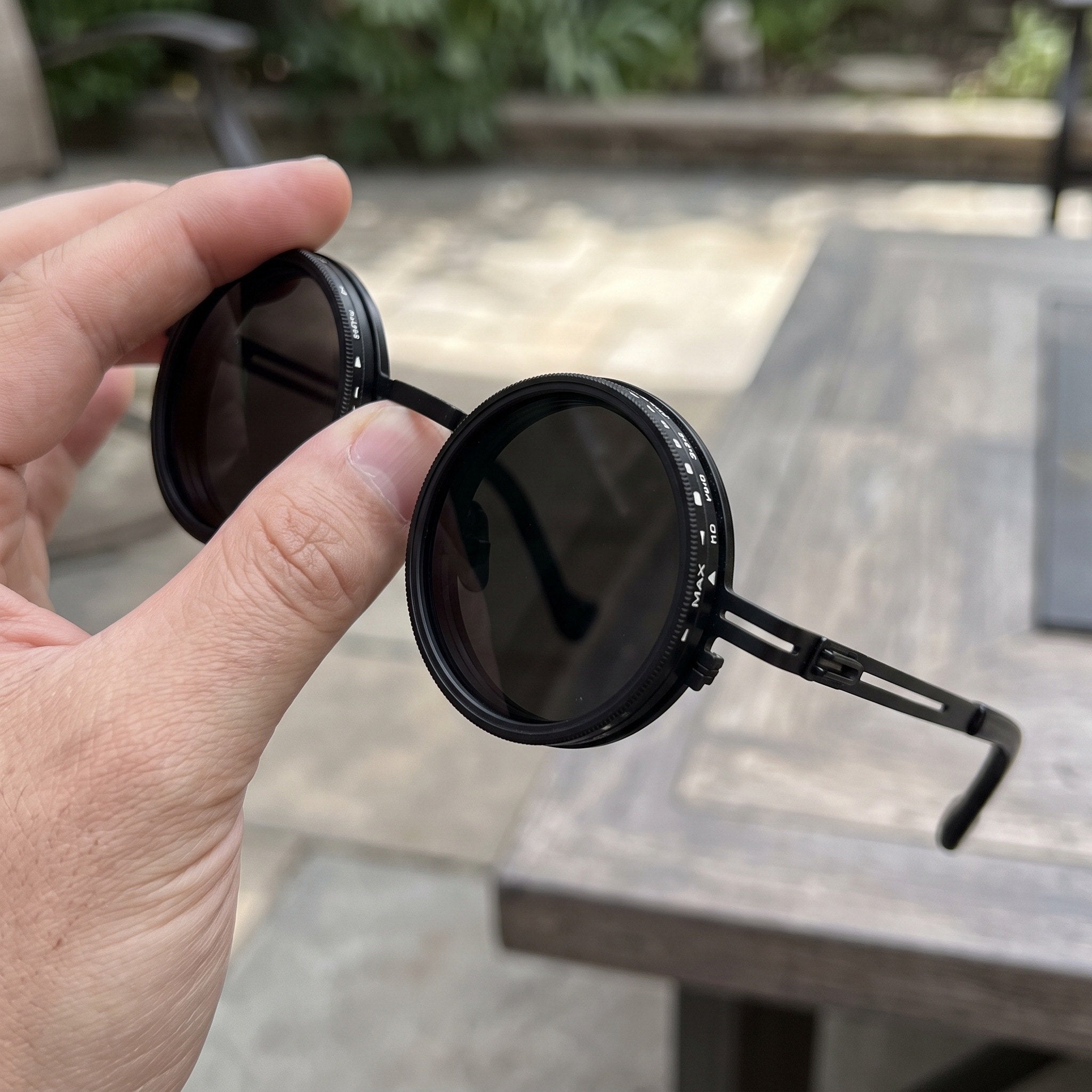 Black Sunglasses Showing The Rotating Rim